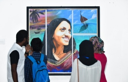 Observers at Unveiling Visions 2018, an art exhibition hosted by Maldivian Artist Community at the National Art Gallery. PHOTO: MIHAARU