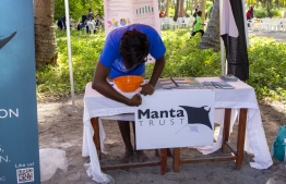 September 1, 2018, L. Maabaidhoo: Manta Trust stall at the Laamu Turtle Festival 2018. PHOTO: HAWWA AMAANY ABDULLA / THE EDITION