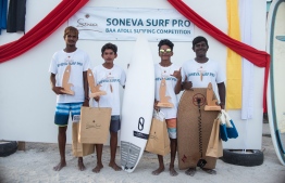 The winners of Soneva Surf Pro pose with their prizes. PHOTO/SONEVA FUSHI