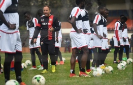 Kenya's national football team "Harambee Stars" French coach Sebastien Migne (L) leads a training session on September 5, 2018, in Nairobi, ahead of the 2019 Africa Cup of Nations qualification football between Kenya and Ghana held on September 8. / AFP PHOTO / SIMON MAINA