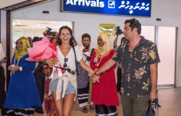 The one millionth tourist to arrive in Maldives in September 2018 receives a colourful welcome. PHOTO: MIHAARU
