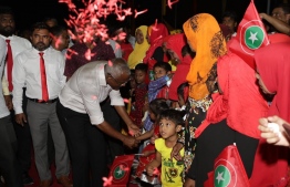 Opposition coalition's presidential candidate Ibrahim Mohamed Solih (Ibu) is warmly received by the people of ADh.Maamigili during his campaign stop. PHOTO/MDP