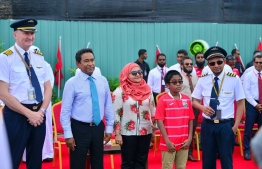 President Abdulla Yameen Abdul Gayoom and First Lady Fathmath Ibrahim and their youngest son with the pilots of Etihad's A380. PHOTO: PRESIDENT OFFICE