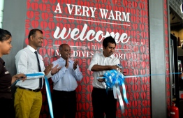 Minister Saeed taking part in the ceremony held to open various franchise restaurants in Velana International Airport. PHOTO: AHMED NISHAATH / MIHAARU