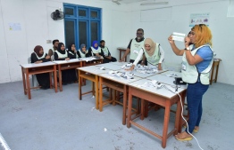 September 23, 2018: Election officials count the ballots after voting ends in the Presidential Election 2018. PHOTO/MIHAARU