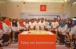 Dhiraagu's staff pose for a picture on the occasion of the company's 30th anniversary. PHOTO/DHIRAAGU
