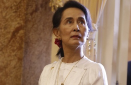 (FILES) In this file photo taken on September 12, 2018 Myanmar State Counsellor Aung San Suu Kyi arrives for a meeting with Vietnam's President Tran Dai Quang (not pictured) at the Presidential Palace at the sideline of the World Economic Forum on ASEAN in Hanoi.
Canada's parliament voted unanimously on September 27, 2018 to effectively strip Myanmar leader Aung San Suu Kyi of her honorary Canadian citizenship over the Rohingya crisis. Ottawa had given the long-detained democracy advocate and Nobel laureate the rare honor in 2007.But her international reputation has become tarnished by her refusal to call out the atrocities by her nation's military against the Rohingya Muslims minority, which Ottawa last week declared a genocide.
 / AFP PHOTO / POOL / KHAM