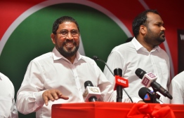 Jumhooree Party's leader Qasim Ibrahim speaks at an opposition gathering after his return to the Maldives. PHOTO/MIHAARU