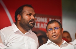 Newly appointed Minister of Tourism Dr Abdulla Mausoom (R) and his predecessor and sacked minister of tourism Ali Waheed. PHOTO: HUSSAIN WAHEED / MIHAARU