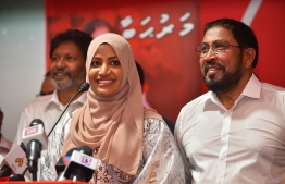Jumhooree Party's Qasim Ibrahim, who has nominated himself for the post of party leader, with his wife and Transport Minister Nahula Ali, who has put forward her name for the post of party deputy leader, at a press conference in the main party hub in Malé / MIHAARU PHOTO