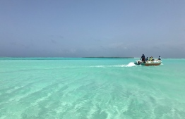 Locals speeding away with illegally obtained white sand from Farukolhu, Shaviyani Atoll. PHOTO: AMINATH NAZRA / THE EDITION