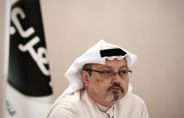 (FILES) In this file photo taken on December 15, 2014, general manager of Alarab TV, Jamal Khashoggi, looks on during a press conference in the Bahraini capital Manama. - US President Donald Trump said October 11, 2018 he was not yet prepared to limit arms sales to Saudi Arabia over journalist Jamal Khashoggi's disappearance, but he faced mounting pressure from concerned American lawmakers. Saudi Arabia is one of the world's largest arms purchasers, with most of them coming from the United States.Khashoggi, a contributor to The Washington Post, vanished more than a week ago during a visit to the Saudi consulate in Istanbul. Turkish government sources say he was murdered there, a claim Riyadh denies. (Photo by MOHAMMED AL-SHAIKH / AFP)