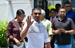 Minister of Youth, Sports and Community Empowerment, Ahmed Mahloof, gestures as he leaves the Supreme Court. PHOTO: NISHAN ALI/MIHAARU