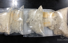 Four packets of suspected drugs seized by the police in Addu on October 17, 2018. PHOTO
: POLICE