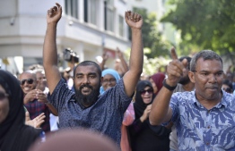Supporters of the opposition coalition celebrate after the Supreme Court announces its verdict on the elections case. PHOTO: NISHAN ALI/MIHAARU