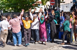 Supporters of the opposition coalition celebrate the Supreme Court's verdict to uphold the results of the Presidential Election 2018. PHOTO/MIHAARU