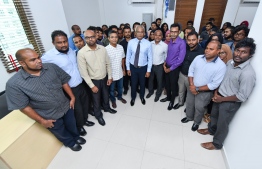 President Elect Ibrahim Mohamed Solih posing for a picture with Mihaaru media staff. PHOTO: HUSSAIN WAHEED / MIHAARU