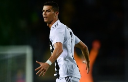 FILE PHOTO: Juventus' Portuguese forward Cristiano Ronaldo celebrates after scoring a goal during the Italian Serie A football match between Empoli and Juventus on October 27, 2018 at the Carlo Castellani Stadium in Empoli. (Photo by MARCO BERTORELLO / AFP)