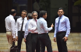 Lawmakers pictured outside the parliament house on October 28, 2018. PHOTO: AHMED NISHAATH/MIHAARU
