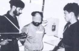 Abdulla Luthfee under custody following the attempted coup d'état of November 3, 1988--