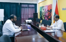 Former President Mohamed Nasheed (R) meets Tourism Minister Ali Waheed. PHOTO/MDP