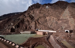 A picture taken on November 14, 2018 shows a general view of the Rogun hydro-electric dam, about 100 km northeast of the Tajik capital Dushanbe, on the Vakhsh River in southern Tajikistan. - Tajikistan on November 16, 2018 inaugurates the USD 3.9 billion hydro-electric power plant, a mega project that will enable the impoverished country to eliminate domestic energy shortages and export electricity to Afghanistan and Pakistan. Built on the Vakhsh River in southern Tajikistan, the  plant championed by President Emomali Rakhmon is expected to reach a height of 335 metres (1,099 feet) in a decade, becoming the world's tallest hydro-electric dam. (Photo by - / AFP)