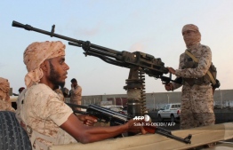 Yemeni pro-government forces are seen at Mukalla port, southwestern Yemen, on November 29, 2018. PHOTO: AFP
