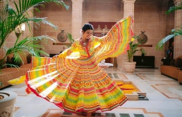 This handout photo released by Raindrop Media on December 1, 2018, shows Bollywood actress Priyanka Chopra dancing during her wedding celebration with American singer Nick Jonas at Umaid Bhawan palace in Jodhpur. - Bollywood actress Priyanka Chopra and American singer Nick Jonas have tied the knot at a lavish ceremony in a royal Indian palace before friends and family. Fireworks lit up the sky as the celebrity couple exchanged vows on December 1 in a Christian ceremony at the opulent Umaid Bhawan palace in Jodhpur, in the western desert state of Rajasthan. (Photo by Handout / RAINDROP MEDIA / AFP) / 