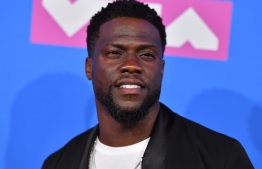 (FILES) In this file photo taken on August 20, 2018 US actor/comedian Kevin Hart attends the 2018 MTV Video Music Awards at Radio City Music Hall on August 20, 2018 in New York City. - US comedian and actor Kevin Hart announced on December 4, 2018, that he would be hosting the 91st Academy Awards in February. (Photo by ANGELA WEISS / AFP)