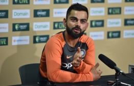India cricket captain Virat Kohli attends a press conference ahead of the first Test at the Adelaide Oval in Adelaide on December 5, 2018. (Photo by PETER PARKS / AFP) / 