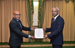 Jumhooree Party (JP)'s Secretary General Ahmed Sameer, receiving his letter of appointment as a Minister at the President's Office. PHOTO: PRESIDENT'S OFFICE