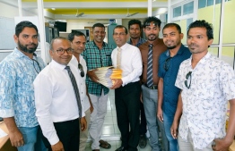 New members hand over their party membership forms to MDP. PHOTO: MDP