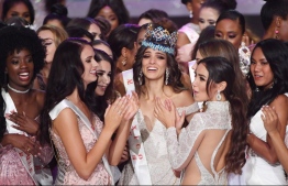Miss Mexico Vanessa Ponce de Leon (C) celebrates with fellow contestants after she was crowned the winner of the 68th Miss World final in Sanya, on the tropical Chinese island of Hainan on December 8, 2018. (Photo by GREG BAKER / AFP)
