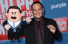 (FILES) In this file photo taken on November 5, 2018 animator Raymond S. Persi arrives for the Disney premiere of "Ralph Breaks The Internet" at El Capitan theatre in Hollywood. - Disney's "Ralph Breaks the Internet" has again topped North American box offices, taking in an estimated $16.1 million for the weekend to narrowly edge out another family-oriented animation, Universal's "The Grinch," industry tracker Exhibitor Relations said December 9, 2018. On a last quiet weekend before the coming crush of holiday films, the order of the top five films on this three-day weekend was, remarkably, exactly the same as last weekend. (Photo by VALERIE MACON / AFP)