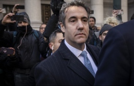 (FILES) In this file photo taken on November 29, 2018, Michael Cohen, former personal attorney to US President Donald Trump, exits federal court, in New York City. - Sentencing of Trump's former lawyer Michael Cohen for lying to Congress over Russia real estate deal will take place December 12, 2018.Cohen's sentencing Wednesday in New York will consolidate his guilty pleas in two cases for convictions relating to his illegal activities on Trump's behalf. (Photo by Drew Angerer / GETTY IMAGES NORTH AMERICA / AFP)