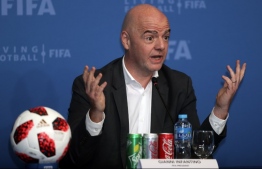 FIFA President Gianni Infantino speaks during a press conference in the Qatar capital, Doha on December 13, 2018. (Photo by KARIM JAAFAR / AFP)