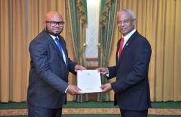President Ibrahim Mohamed Solih (R) awards letter of appointment to Ali Nazeer, State Minister for Home Affairs. PHOTO/PRESIDENT'S OFFICE
