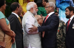 President Ibrahim Mohamed Solih welcomes Indian Prime Minister Narendra Modi during the former's swearing-in ceremony. PHOTO: AFP