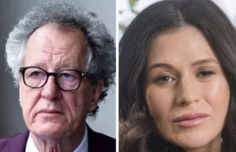 On the left is Geoffrey Rush, and on the right is Yael Stone.