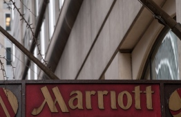 (FILES) In this file photo taken on November 30, 2018 The Marriott logo is seen in Washington, DC, on November 30, 2018 after Marriott International announced that up to 500 million hotel guests may have had their data compromised in a hack of the Starwood reservation database. - The United States said December 12, 2018 that China was behind the massive hack of data from hotel giant Marriott, part of an ongoing global campaign of cyber-theft run by Beijing.Secretary of State Mike Pompeo confirmed to Fox News' Fox & Friends program that the government believes China masterminded the Marriott data theft."They have committed cyber attacks across the world," he told the show. (Photo by NICHOLAS KAMM / AFP)