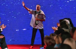 (FILES) In this file photo taken on September 11, 2018 Belgian fashion designer Raf Simons waves to his guests on the runway at the Calvin Klein 205W39NYC Spring 2019 Men's and Women's runway show during New York Fashion Week in New York City. - Belgian fashion designer Raf Simons, considered one of the most talented of his generation, will leave Calvin Klein little more than two years after joining it, parent company PVH said on December 21, 2018. (Photo by Angela Weiss / AFP)