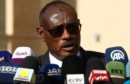 Sudanese Foreign Minister Al-Dierdiry Ahmed delivers a speech to the media following a meeting with Sudan's President in the capital Khartoum on December 27, 2018. - Egypt's foreign minister and intelligence chief are in Sudan for talks with government officials facing deadly protests and calls for President Omar al-Bashir to step down over price hikes. (Photo by ASHRAF SHAZLY / AFP)