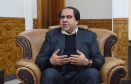 Afghan football boss Keramuddin Karim gestures as he speaks during an interview with AFP in Kabul on December 31, 2018. - Afghan football boss Keramuddin Karim on December 31 rejected allegations he sexually and physically abused members of the women's national team, suggesting his accusers may have invented the claims to help their applications for asylum in Europe. Speaking to the media for the first time since the allegations against him and four male colleagues were reported by Britain's Guardian newspaper in November, Karim told AFP he had never punched, raped or threatened players and was confident his name would be cleared. (Photo by WAKIL KOHSAR / AFP)