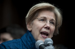 (FILES) In this file photo taken on January 29, 2017 US Senator Elizabeth Warren, D-MA, speaks to people gathered at Copley Square in Boston, Massachusetts to decry US President Donald Trump's sweeping executive order, which restricts refugees and travellers from seven Muslim-majority countries. - Democratic Senator Elizabeth Warren -- a fierce critic of Donald Trump -- on December 31, 2018 took a major step towards a likely run for president, seeking to upset the incumbent Republican in 2020. The 69-year-old Warren, who has represented Massachusetts in the Senate since 2013, is a progressive Democrat. She said she was launching an exploratory committee for president, which would help her raise funds early in the campaign cycle. (Photo by Ryan McBride / AFP)