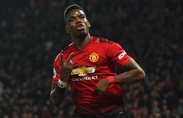 Manchester United's French midfielder Paul Pogba celebrates after scoring his and their second goal during the English Premier League football match between Manchester United and Bournemouth at Old Trafford in Manchester, north west England, on December 30, 2018. PHOTO: PAUL ELLIS / AFP