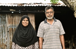 Toddy tapper Ali Abdurrahman and his wife, Haseena Ali, pose for a picture. PHOTO: HAWWA AMAANY ABDULLA/THE EDITION