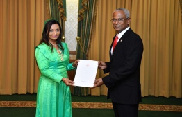 Newly appointed State Minister for Gender, Family and Social Services Ifham Hussain with President Solih. PHOTO: PRESIDENT'S OFFICE