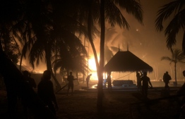 Fire rescuers and Gili Lankan Fushi staff working to control the fire.