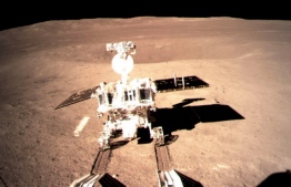 This picture taken on January 3, 2019 and received on January 4 from the China National Space Administration (CNSA) via CNS shows a robotic lunar rover on the "dark side" of the moon. - A Chinese lunar rover landed on the far side of the moon on January 3, in a global first that boosts Beijing's ambitions to become a space superpower. (Photo by China National Space Administration (CNSA) via CNS / China National Space Administration (CNSA) via CNS / AFP) / 