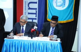 CEO of MI College Ahmed Motakee and Chancellor of UTHM Dr Waheed Bin Razalee signing the agreement. PHOTO: MIHAARU